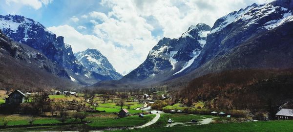 Panoramic shot of snowcapped mountains against sky