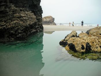 View of rock formations on beach