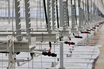 Low angle view of people walking on railroad station