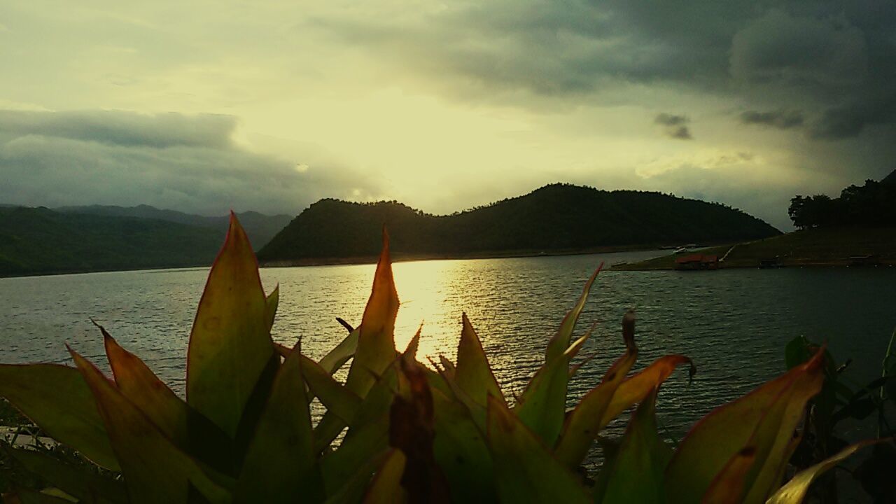 water, sky, tranquil scene, tranquility, scenics, beauty in nature, cloud - sky, sea, mountain, nature, plant, cloud, cloudy, lake, sunset, idyllic, outdoors, growth, no people, mountain range