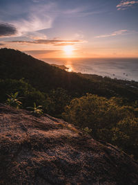 Scenic high angle view of sunset sky over horizon. west coast viewpoint, koh tao island, thailand.