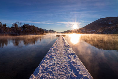 Beautiful wooden jetty at a mountain lake, salzkammergut, austria