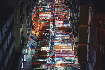 View of illuminated market at night