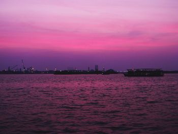 Scenic view of sea at sunset