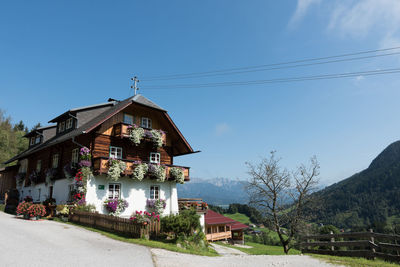 Built structures against clear blue sky