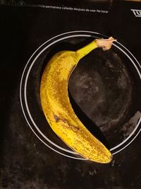 High angle view of yellow slices in bowl on table