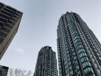 Low angle view of modern buildings against sky