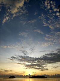 Low angle view of dramatic sky during sunset