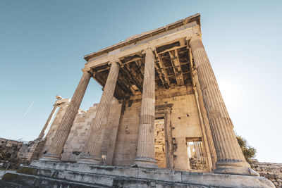 Low angle view of old ruins against clear sky