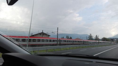 Cropped image of car on road