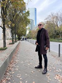 Low section of woman walking on street frankfurt skyline skyscrapers germany 