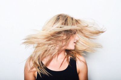 Portrait of young woman looking away