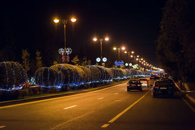 Light trails on road at night