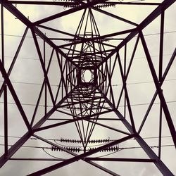 Low angle view of electricity pylon