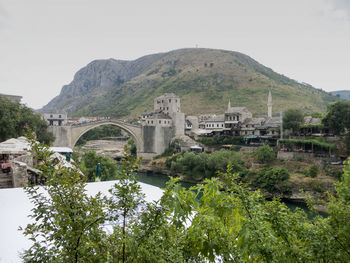 Built structure with mountain range in background