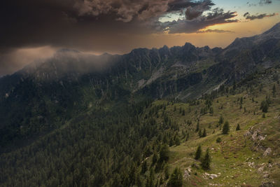 Scenic view of mountains against sky during sunset