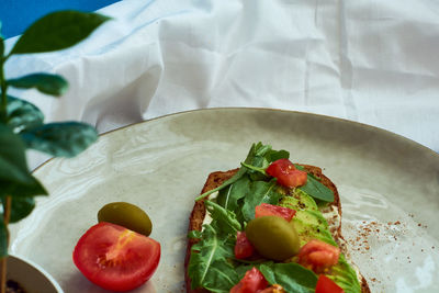 High angle view of fruits in plate on table