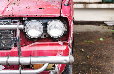 Headlights of abandoned car