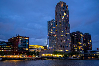 Illuminated buildings in city at night