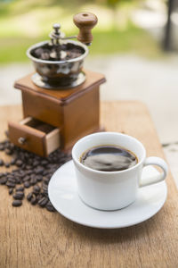 Close-up of coffee cup on table