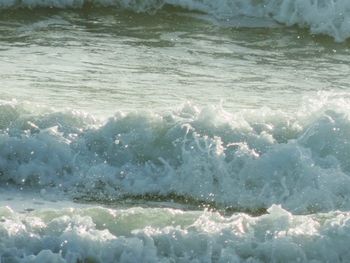 Waves splashing on rocks