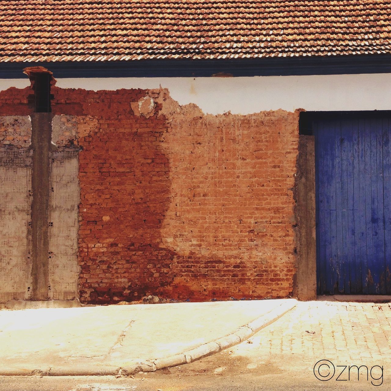 architecture, built structure, building exterior, brick wall, window, wall - building feature, house, wall, stone wall, old, residential structure, building, outdoors, day, residential building, brick, low angle view, sunlight, no people, door