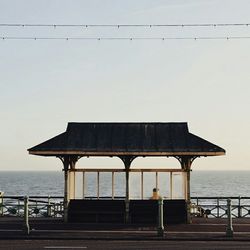 Pier on sea against sky