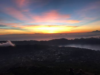 Scenic view of silhouette landscape against sky during sunset