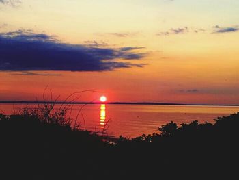 Scenic view of sunset over sea