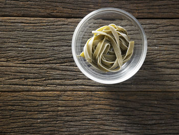 High angle view of tagliatelle pasta on table