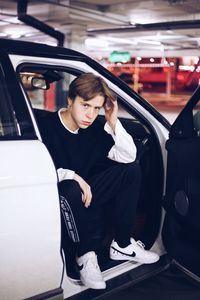 Woman sitting in car