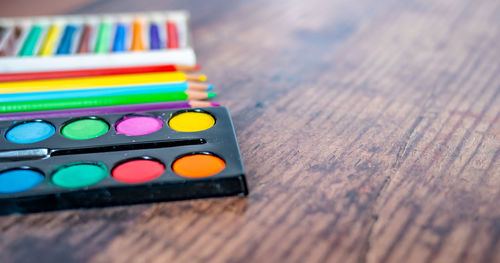 High angle view of multi colored pencils on table