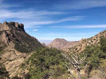 Scenic view of rocky mountains against sky