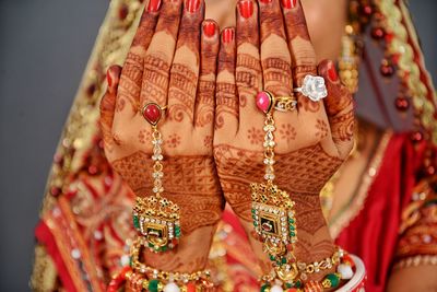 Close-up of bride with henna tattoo