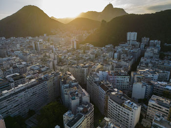 High angle view of townscape against mountain