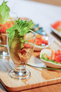 Close-up of fruit in glass on table