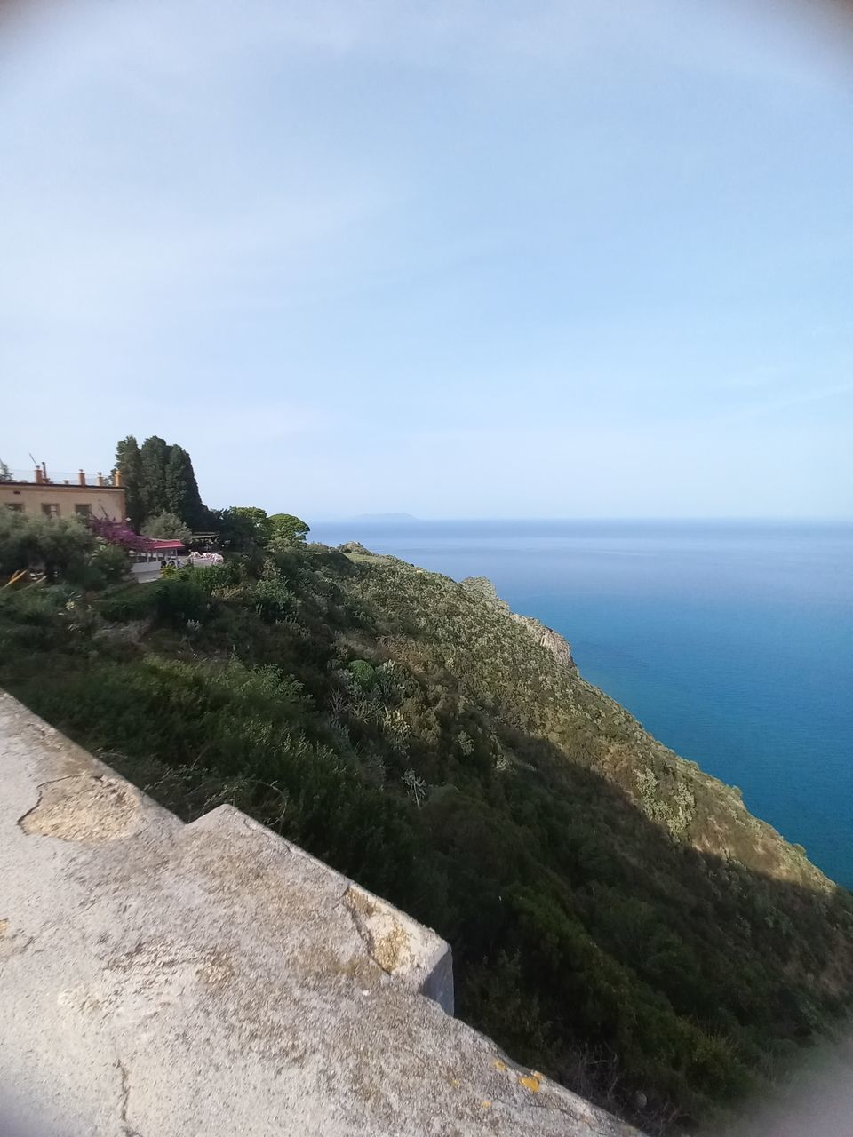 nature, sky, blue, day, rock, terrain, plant, no people, low angle view, mountain, architecture, beauty in nature, outdoors, cliff, sunlight, scenics - nature, tree, reflection, travel destinations, travel, built structure, tranquility, land, clear sky