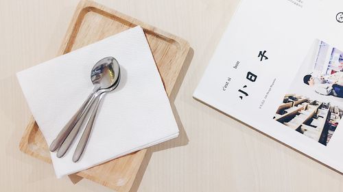 High angle view of paper on table