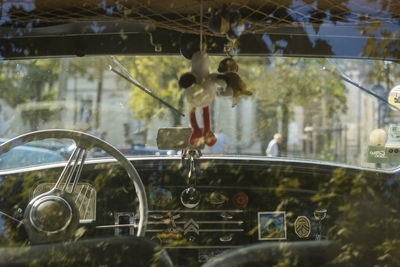 Toy hanging in vintage car