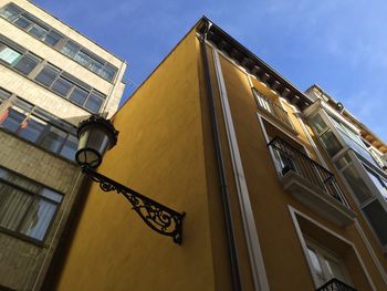 Low angle view of building against blue sky