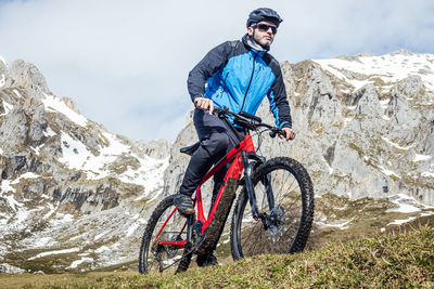 Cyclist man riding mountain bike