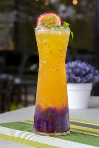 Close-up of drink on glass table