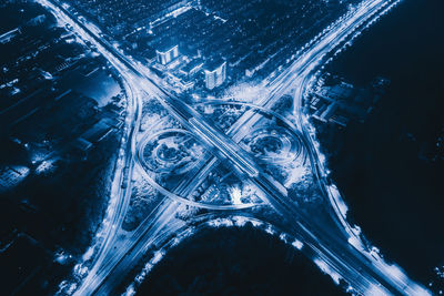 High angle view of illuminated city at night