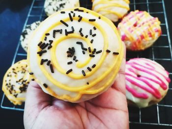 Close-up of hand holding ice cream