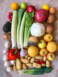 Healthy eating grocery shopping or delivery of fresh variety fruits and vegetables on craft paper. 