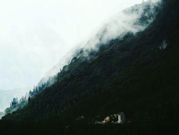 Scenic view of mountains against sky during winter