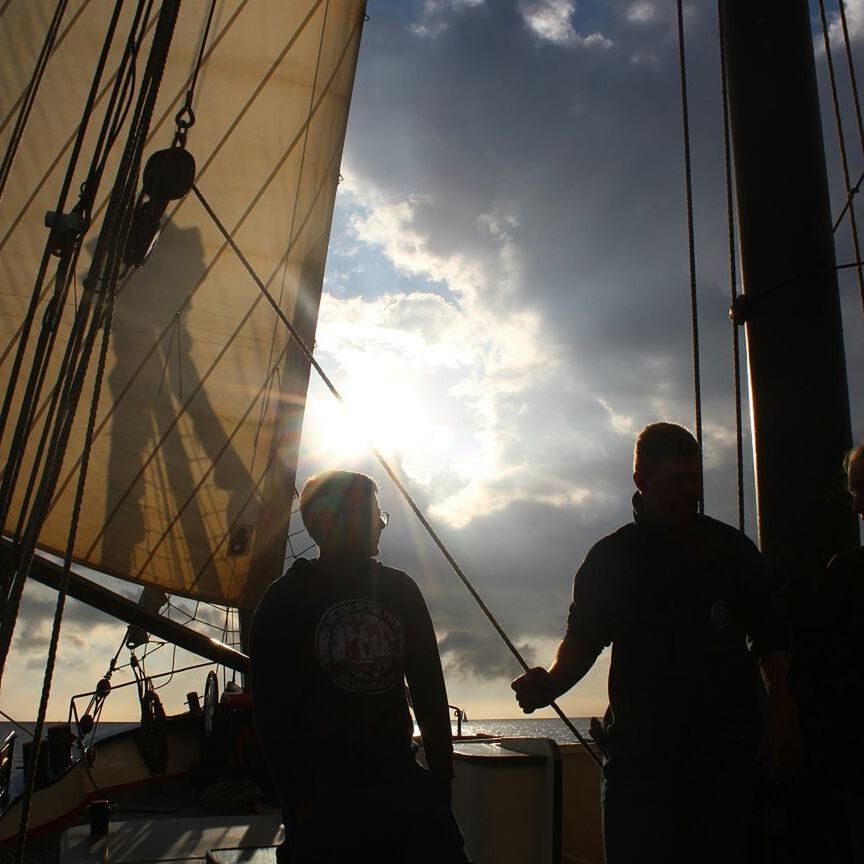 real people, men, silhouette, nautical vessel, sailing, standing, two people, sea, leisure activity, cloud - sky, outdoors, sailboat, sky, vacations, day, nature, mast, boat deck, sailing ship, adult, people