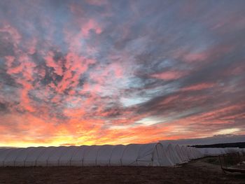 Scenic view of dramatic sky during sunset