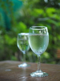 Close-up of wineglass on table