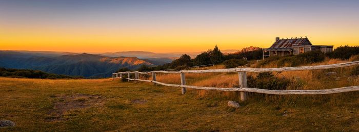 Scenic view of landscape against sky during sunset